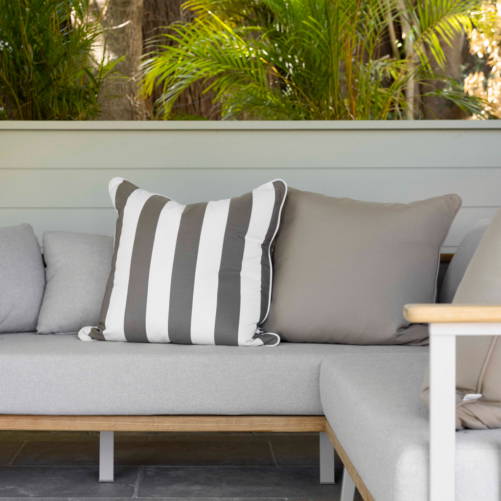 stripey stone and white outdoor cushion